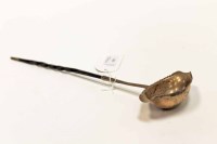 Lot 553 - GEORGE III OR LATER SILVER PUNCH LADLE the...
