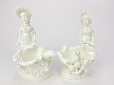 Lot 1079 - A PAIR OF MOORE FIGURAL DISHES