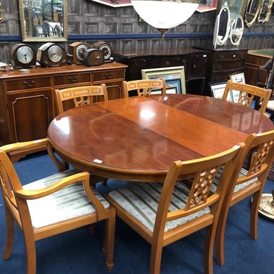 Lot 511 - A MODERN DINING SUITE