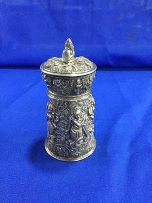 Lot 702 - AN INDIAN WHITE METAL PEPPER GRINDER AND A PAIR OF METAL CONDIMENT CASTERS