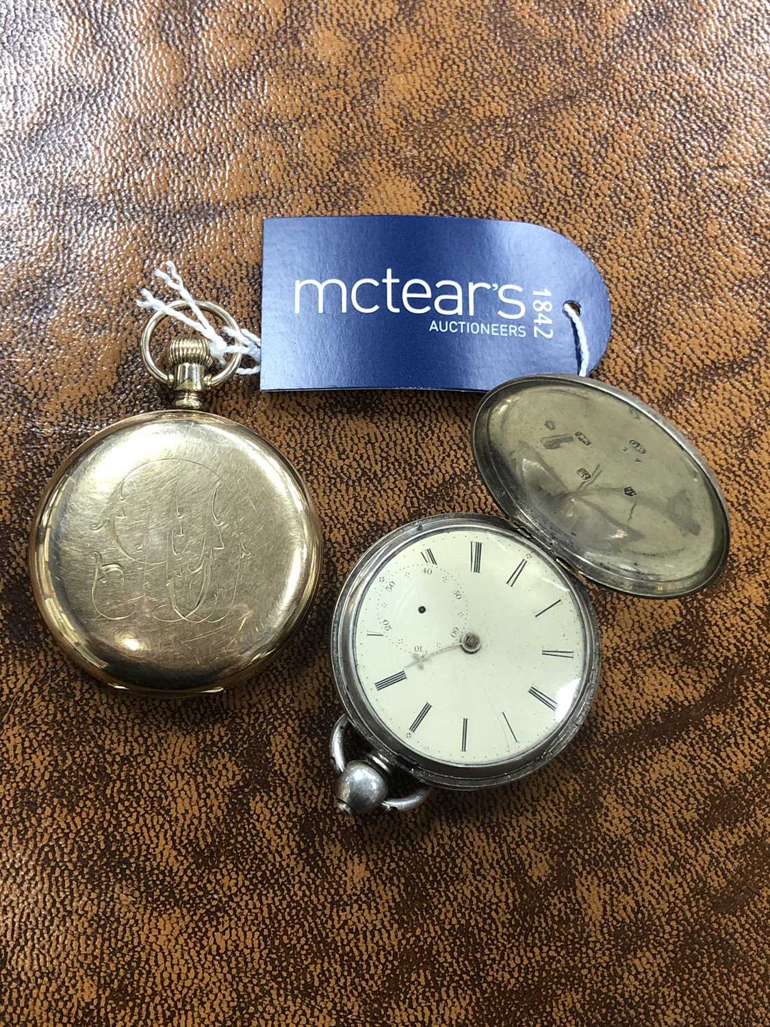 Lot 60 - A SILVER POCKET WATCH AND A ROLLED GOLD POCKET WATCH
