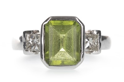 Lot 1380 - A GREEN GEM SET AND DIAMOND RING