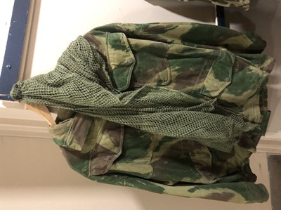 Lot 43 - A COLLECTION OF MILITARY CAMOUFLAGE JACKETS AND TROUSERS