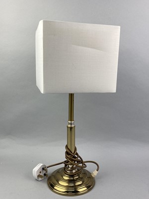 Lot 22 - A BRASS TABLE LAMP ALONG WITH TWO CANDLESTICKS