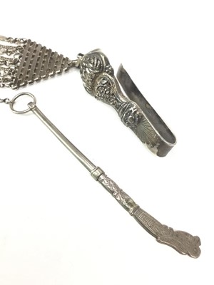 Lot 754 - A CHINESE SILVER AND WHITE METAL CHATELAINE