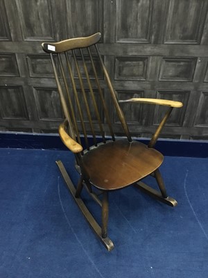 Lot 222 - A 1970'S SPINDLE BACK ROCKING CHAIR