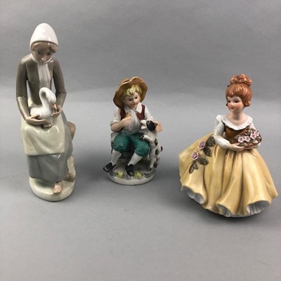 Lot 288 - A SPANISH FIGURE OF A GIRL AND GOOSE ALONG WITH OTHER FIGURES AND TWO DOLLS
