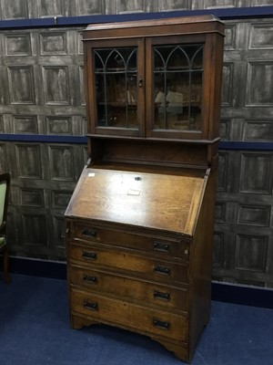 Lot 371 - A 20TH CENTURY OAK BUREAU BOOKCASE