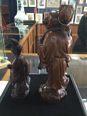 Lot 877 - A LOT OF TWO CHINESE CARVED WOOD FIGURES