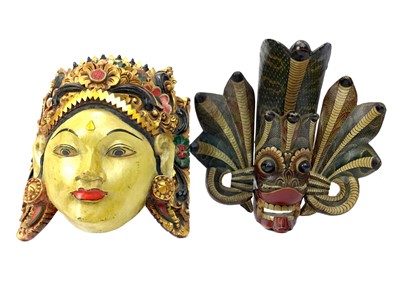 Lot 879 - A LOT OF TWO CARVED WALL MASKS