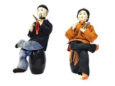 Lot 885 - A PAIR OF CHINESE FIGURES OF OPIUM SMOKERS
