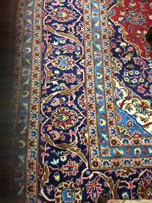 Lot 1731 - A HAND-KNOTTED PERSIAN CARPET
