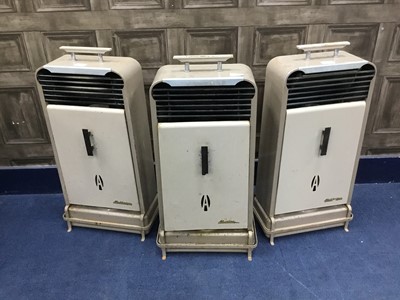 Lot 394 - A LOT OF THREE ALADDIN PINK HEATERS