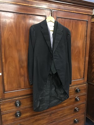 Lot 410 - A VINTAGE WEDDING DRESS, TAIL COAT AND A TOP HAT