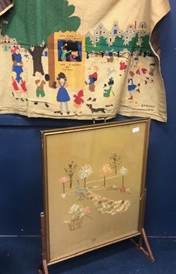 Lot 411 - A 20TH CENTURY FIRESCREEN AND A PUNCH AND JUDY TAPESTRY