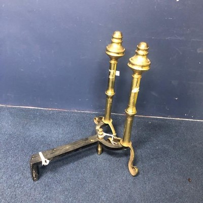 Lot 429 - A PAIR OF BRASS FIRE DOGS