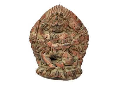 Lot 903 - A 20TH CENTURY EASTERN POTTERY MODEL OF A DEITY