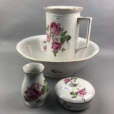 Lot 387 - A HAND PAINTED CERAMIC EWER AND BASIN, VASE AND A LIDDED DISH