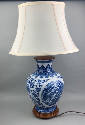 Lot 456 - A PAIR OF CHINESE BLUE AND WHITE VASES CONVERTED TO TABLE LAMPS