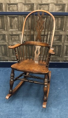 Lot 326 - A 20TH CENTURY MAHOGANY ROCKING CHAIR