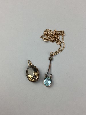 Lot 438 - AN EDWARDIAN  GOLD PENDANT ON CHAIN