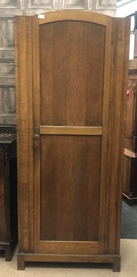 Lot 596 - A 20TH CENTURY OAK SINGLE DOOR WARDROBE