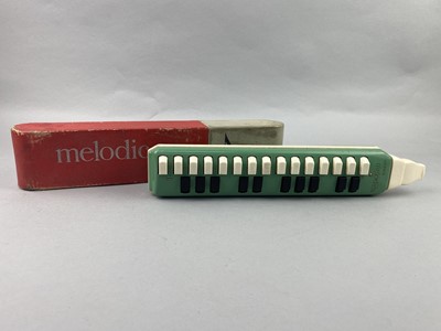 Lot 60 - A HOHNER MELODICA IN BOX