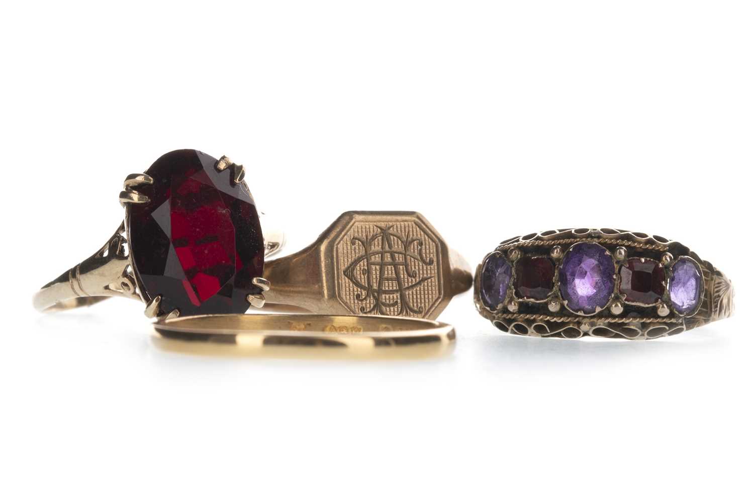 Lot 343 - FOUR GOLD RINGS