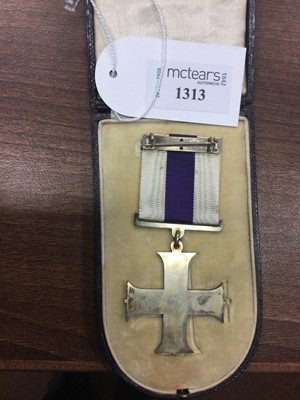 Lot 1313 - A MILITARY CROSS AND THREE OTHER MEDALS
