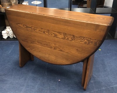 Lot 348 - AN ERCOL DROP LEAF DINING TABLE