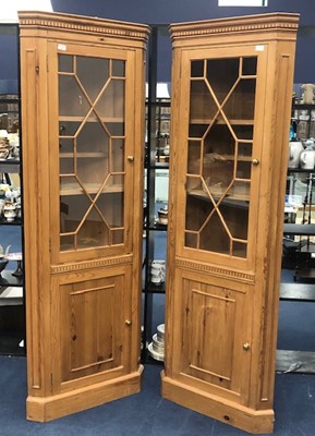 Lot 350 - A PAIR OF MODERN PINE CORNER CABINETS