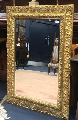 Lot 402 - A GILTWOOD AND PLASTER RECTANGULAR WALL MIRROR