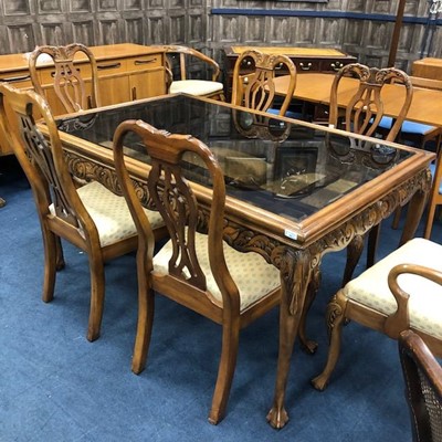 Lot 404 - A 20TH CENTURY HARDWOOD DINING TABLE WITH EIGHT CHAIRS
