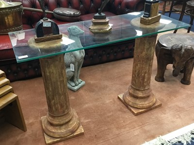 Lot 407 - A MODERN TWIN PILLAR GLASS TOPPED TABLE