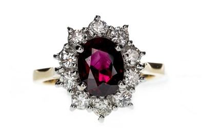 Lot 840 - A RUBY AND DIAMOND CLUSTER RING