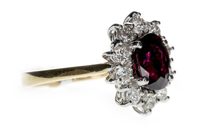 Lot 840 - A RUBY AND DIAMOND CLUSTER RING