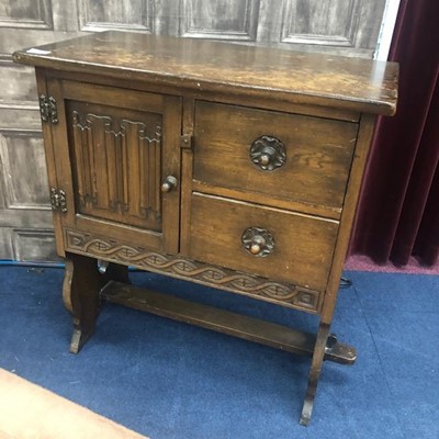 Lot 415 - AN OAK CUPBOARD