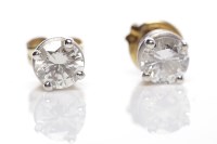 Lot 31 - PAIR OF DIAMOND STUD EARRINGS each set with a...