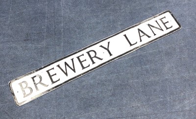 Lot 189 - BREWERY LANE - A PAINTED CAST METAL STREET SIGN