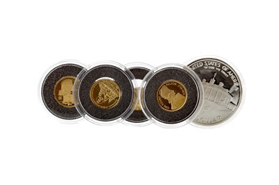 Lot 23 - FOUR GOLD MINIATURE GOLD COINS OF THE WORLD AND A GEORGE WASHINGTON SILVER PROOF HALF DOLLAR