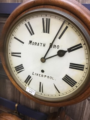 Lot 1132 - AN EARLY 20TH CENTURY WALL CLOCK BY MORATH BROS.