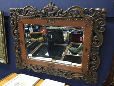 Lot 476 - A BEVELLED WALL MIRROR