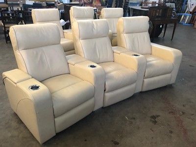 Lot 498 - A HOME CINEMA CREAM LEATHER SUITE