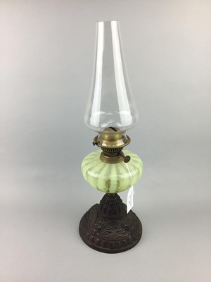 Lot 56 - AN OIL LAMP WITH URANIUM GLASS RESERVE