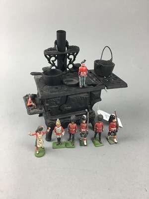 Lot 139 - A MINIATURE CAST METAL STOVE AND A GROUP OF LEAD SOLDIERS
