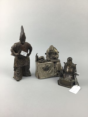 Lot 146 - A BRONZED SPELTER FIGURE OF A SAMURAI, A FIGURE OF A SEATED IMMORTAL AND ANOTHER FIGURE