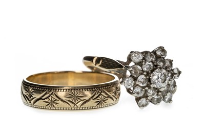 Lot 897 - A GEM SET CLUSTER RING AND A WEDDING BAND