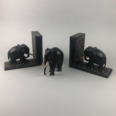 Lot 275 - A PAIR OF EBONY BOOKENDS AND ELEPHNAT FIGURES