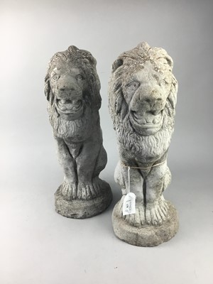 Lot 178 - A PAIR OF STONE AND CONCRETE AGGREGRATE GARDEN LION FIGURES