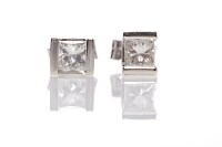 Lot 104 - PAIR OF DIAMOND STUD EARRINGS each set with a...